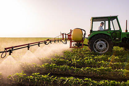 Farmers using pesticides
