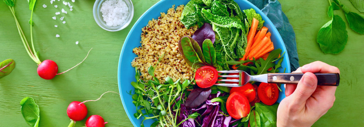 Fresh juicy and crusty buddha bowl healthy meal with quinoa and green sprouts