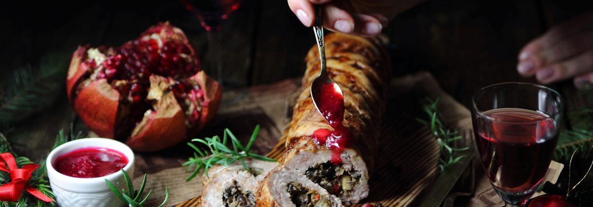 girl cooks meatloaf with mushrooms and lingonberry sauce